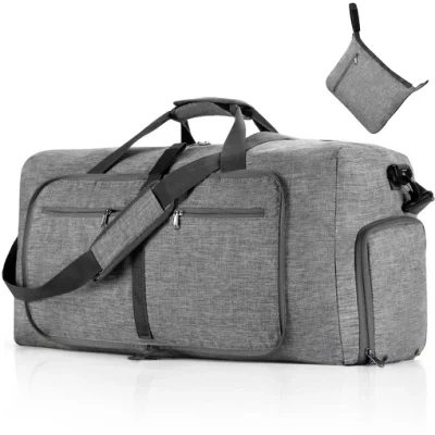 Atacado 65l impermeável dobrável portátil esporte saco de viagem ao ar livre durante a noite náilon grande capacidade fitness mochila